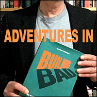 Jonathan Ochshorn holding Building Bad book with text saying 'Adventures in' right above the book cover text, 'Building Bad'